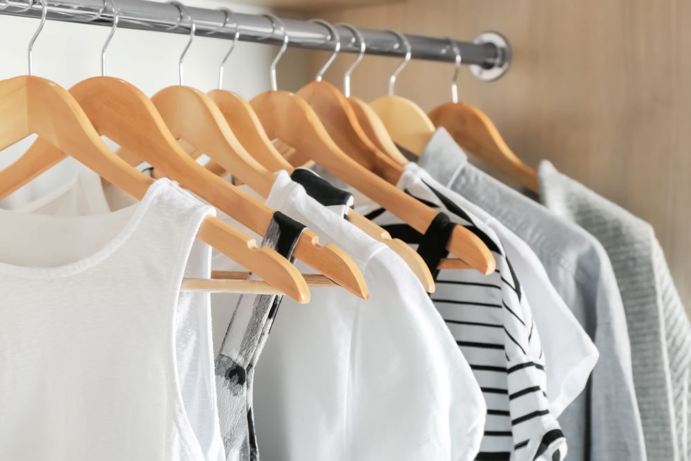 How To Organize Closet - Clothes On Hangers