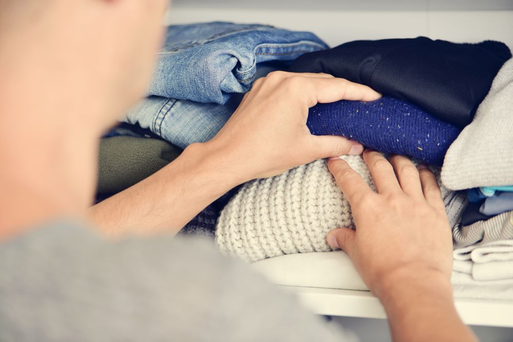 How To Organize Closet - Folded Sweaters