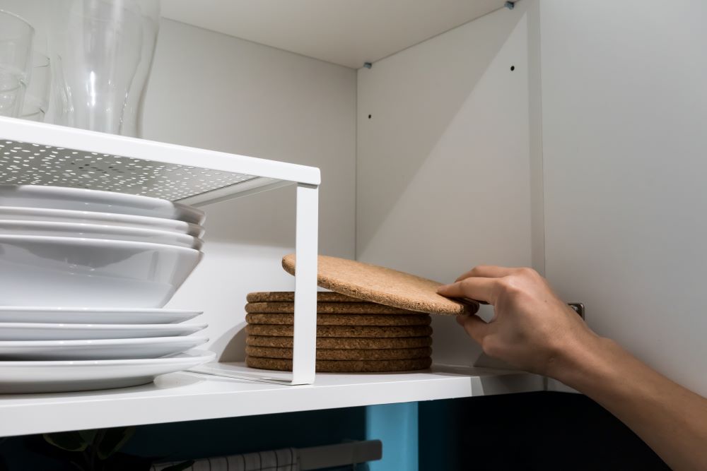 How To Organize Your Kitchen Cabinets - Use Shelf Risers